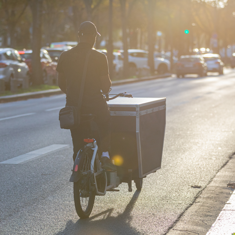man riding on cargo e-bike